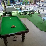 Oasis Apartments & Bar