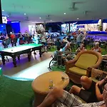 Oasis Apartments & Bar