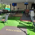 Oasis Apartments & Bar