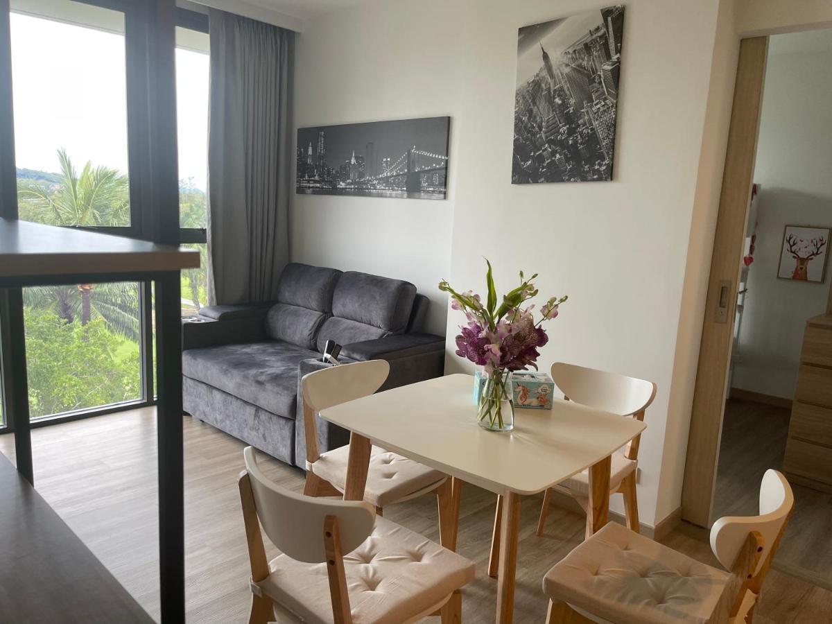 Laguna Skypark: Golf View With Rooftop Pools Apartment