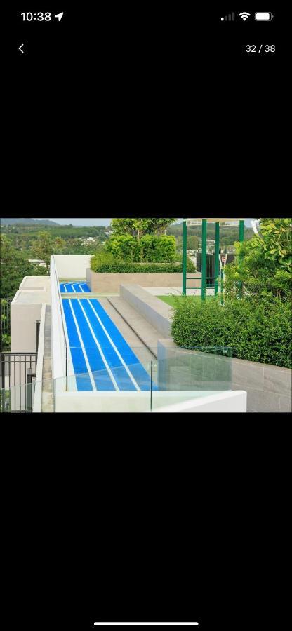 Laguna Skypark: Golf View With Rooftop Pools Apartment