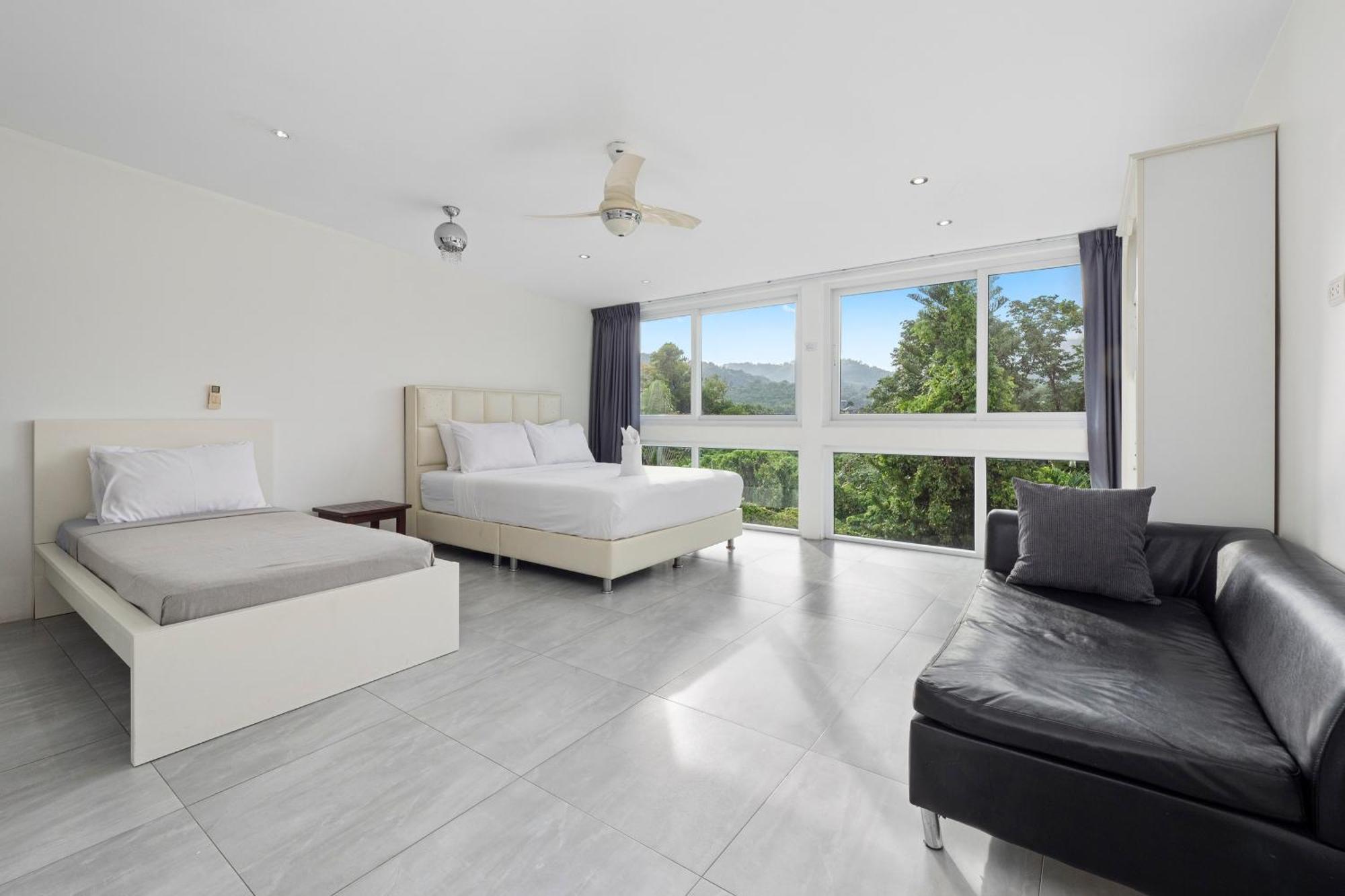 4 Bedrooms & Bathroom For Up To 12 Guests 7kms To Patong At The Fairways Golf Phuket