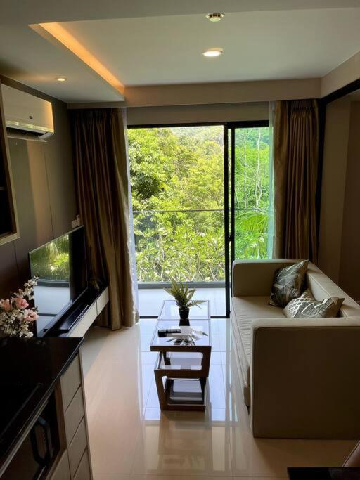 In Mida Grande Surin Apartment