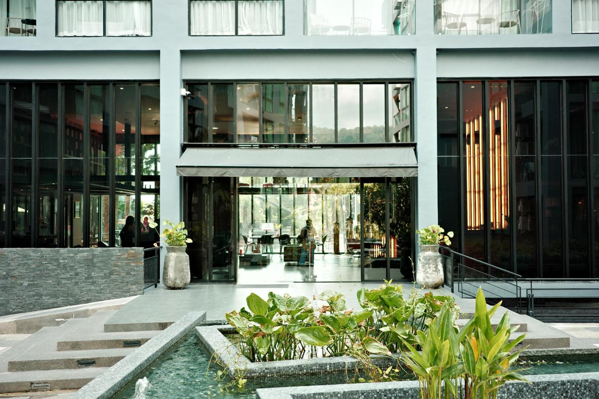 Sabay N303 With Scenic Pool View Surrounded By Palm Trees In Citygate Kamala Phuket