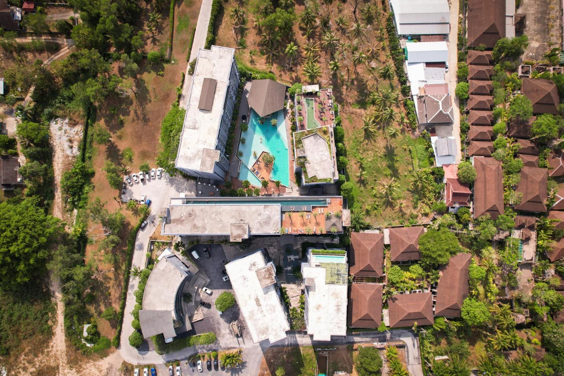 Apartment Sabay N303 With Scenic Pool View Surrounded By Palm Trees In Citygate Kamala Phuket