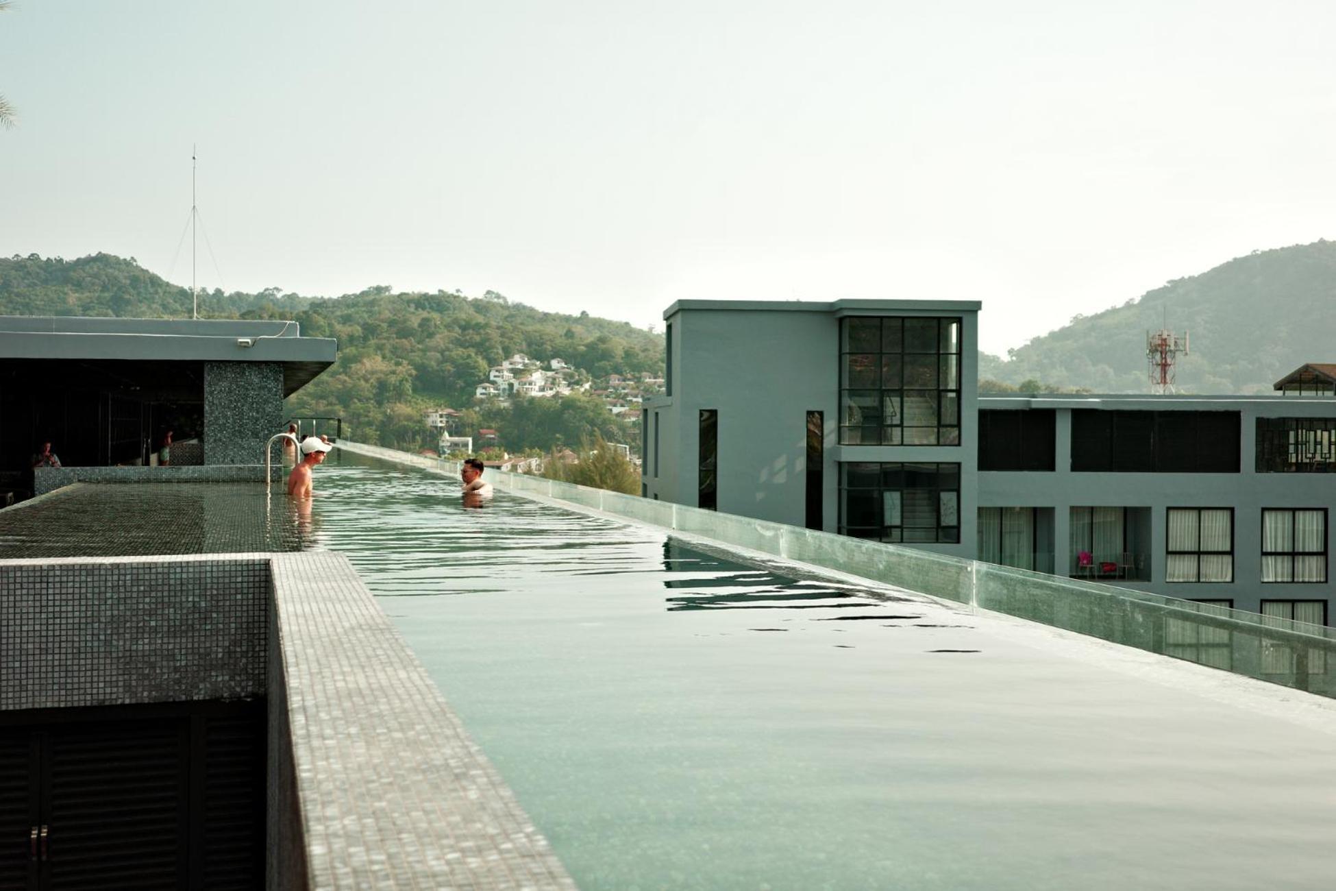 Apartment Sabay N303 With Scenic Pool View Surrounded By Palm Trees In Citygate Kamala Phuket