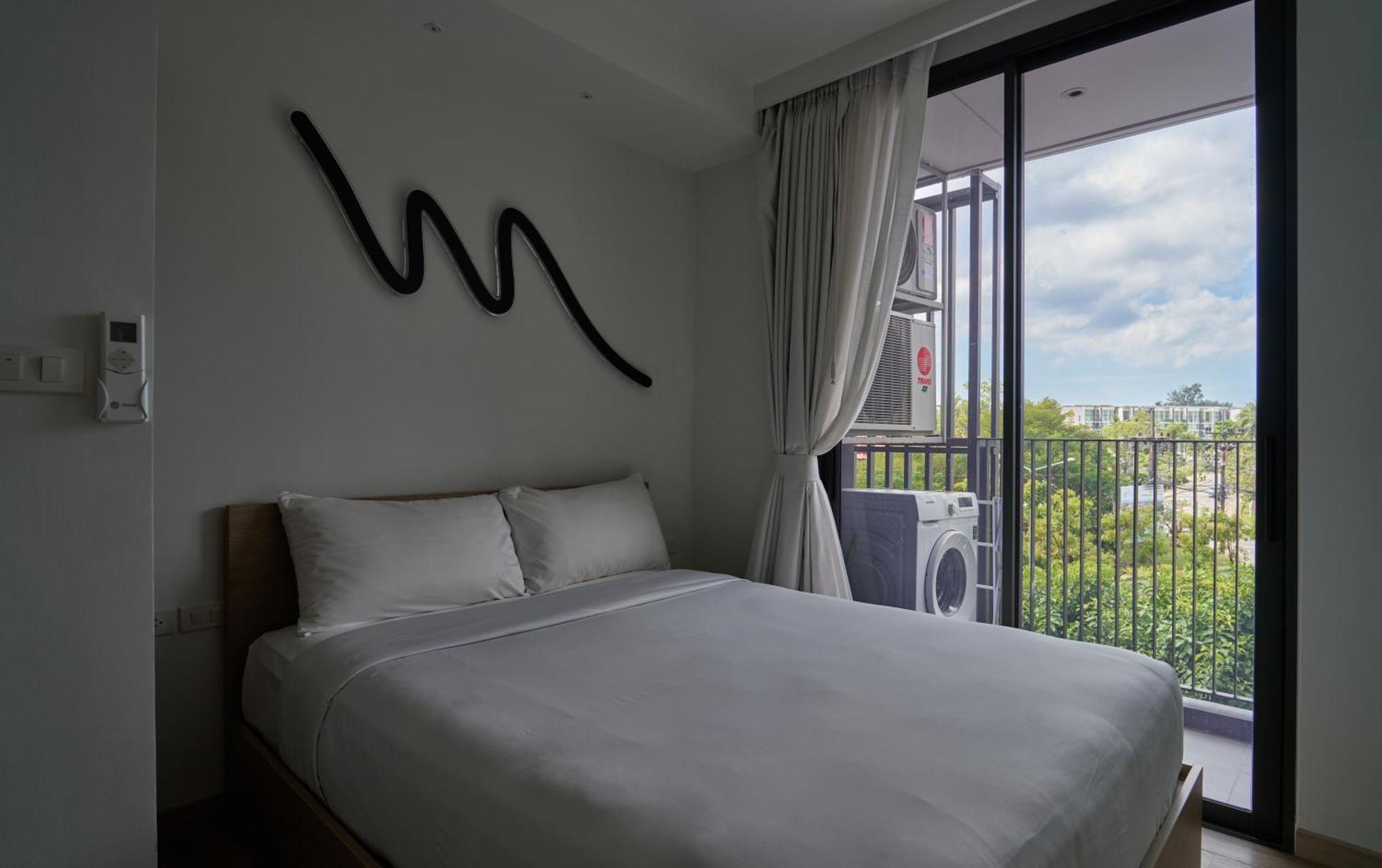 Modern 2-bedroom With Washer In Skypark Laguna Bang Tao Phuket